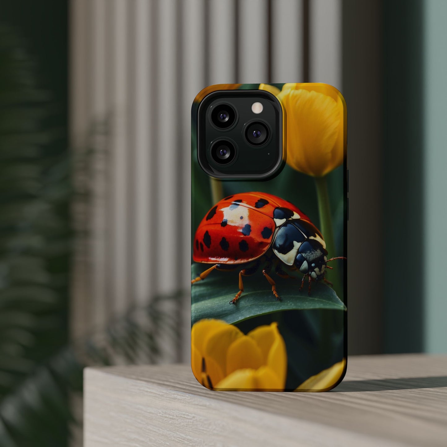 MagSafe iPhone Case: Vibrant Ladybug Amidst a Lush Yellow Flower Garden