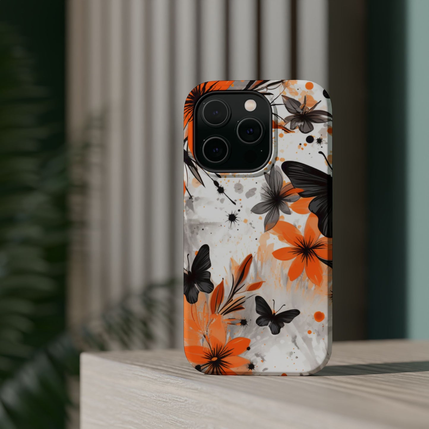 Orange Blossom & Black Butterfly MagSafe iPhone Case – Bold Floral Pattern with Modern Abstract Style