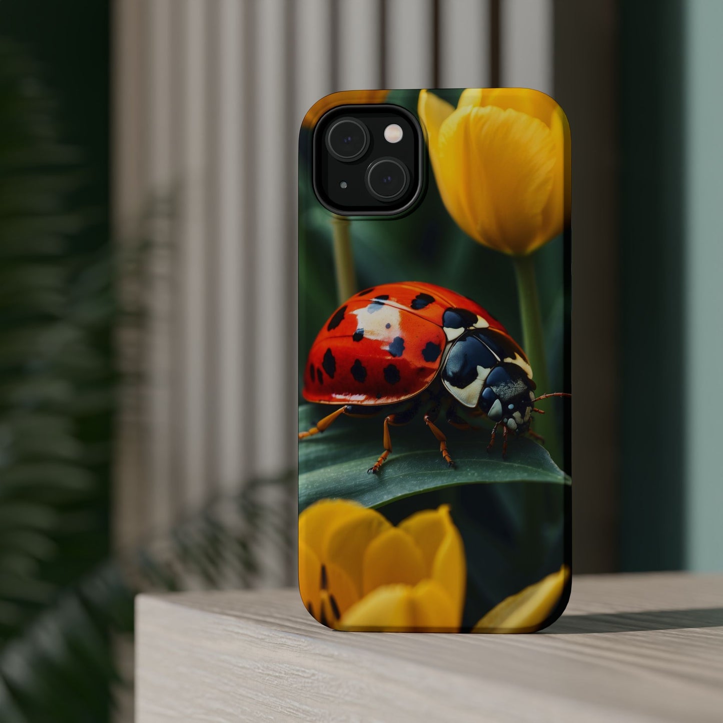 MagSafe iPhone Case: Vibrant Ladybug Amidst a Lush Yellow Flower Garden