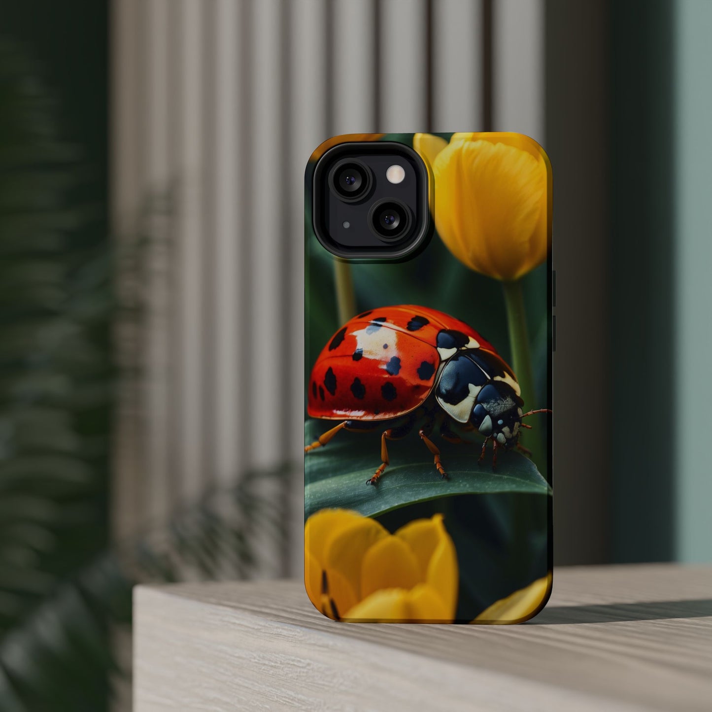 MagSafe iPhone Case: Vibrant Ladybug Amidst a Lush Yellow Flower Garden